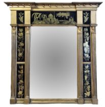 A 19TH CENTURY EGYPTIAN REVIVAL GILT FRAMED MIRROR The break front cornice above reverse glass