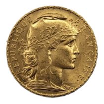 AN EARLY 20TH CENTURY FRENCH 22CT GOLD 20 FRANC COIN, DATED 1912 Bearing a bust of Marianne