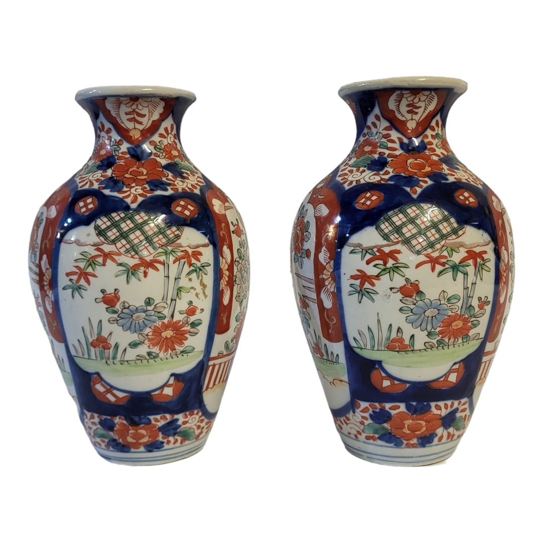 A PAIR OF 18TH CENTURY JAPANESE IMARI STYLE VASES Taking baluster form with painted floral - Image 2 of 9
