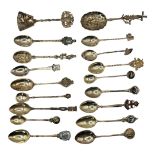 A COLLECTION OF EARLY 20TH CENTURY SILVER AND WHITE METAL SOUVENIR SPOONS To include six with enamel