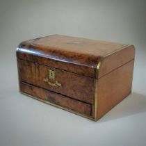 A VICTORIAN BURR WALNUT AND BRASS INLAID TRAVELLING VANITY CASE The mirrored and velvet lined fitted