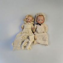 HEUBACH BROTHERS, GEBRUDER HEUBACH, A BISQUE HEADED BEBE DOLL Five piece jointed composition body,