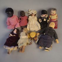 A COLLECTION OF EIGHT VARIOUS EARLY 20TH CENTURY SMALL GERMAN BISQUE HEADED DOLLS Consisting of