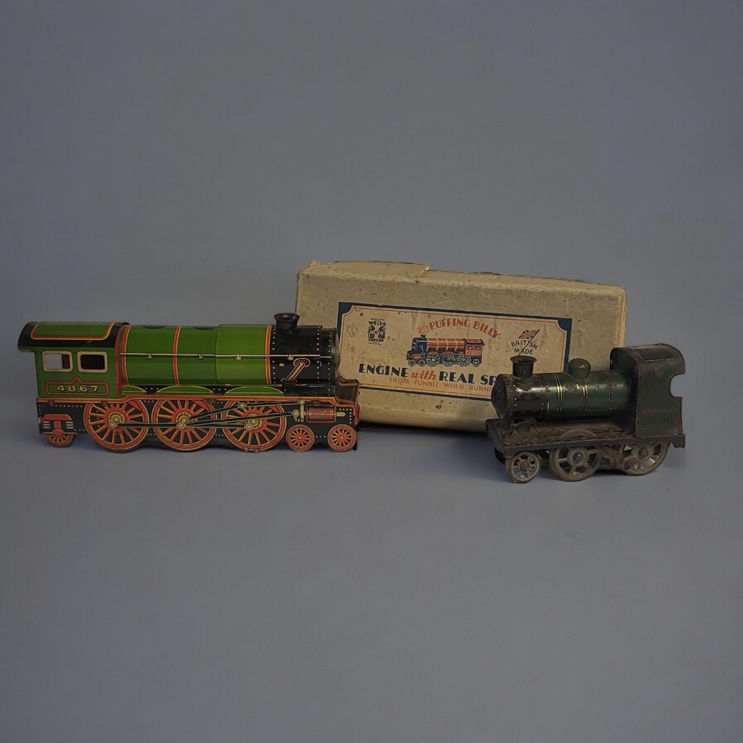 A 1930’S BOXED PUFFING BILLY TINPLATE PAINTED CLOCKWORK MODEL OF LOCOMOTIVE BY WELLS OF LONDON