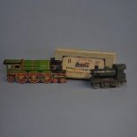 A 1930’S BOXED PUFFING BILLY TINPLATE PAINTED CLOCKWORK MODEL OF LOCOMOTIVE BY WELLS OF LONDON