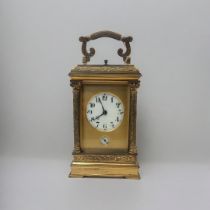 A 19TH CENTURY GILT BRASS GRANDE SONNERIE CARRIAGE CLOCK Having a single carry handle, bevelled