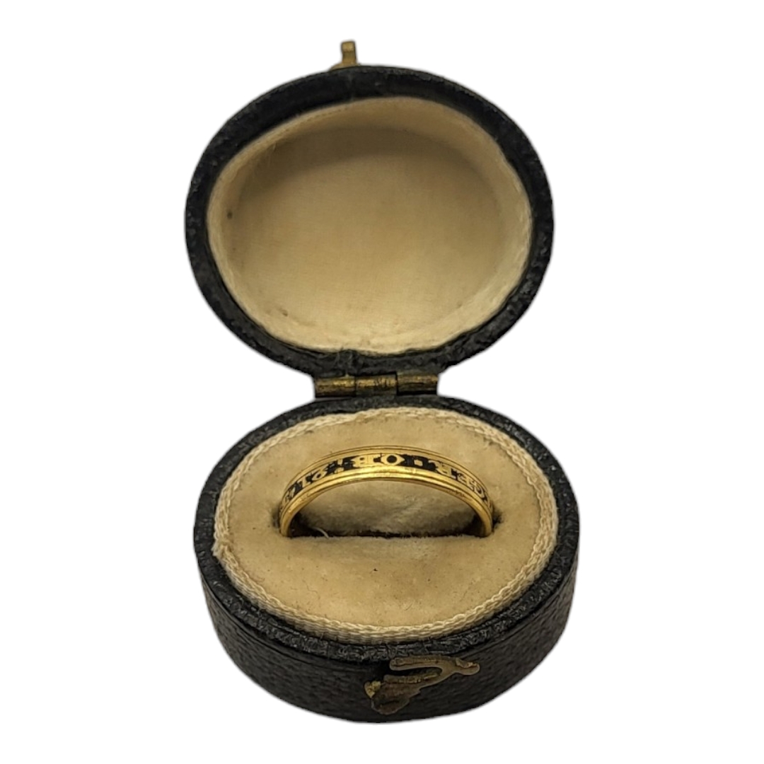 A GEORGIAN SILVER GILT AND ENAMEL MOURNING RING Marked in blue Enamel 'Ettz Pinniger Ob 21 Feb 1799,