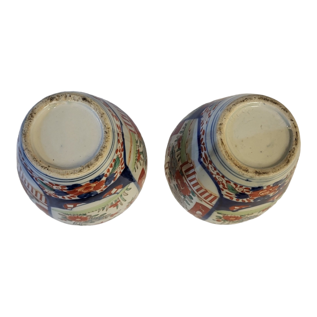 A PAIR OF 18TH CENTURY JAPANESE IMARI STYLE VASES Taking baluster form with painted floral - Image 8 of 9