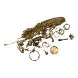 A COLLECTION OF VINTAGE 9CT GOLD JEWELLERY To include necklaces and charms. Condition: AF