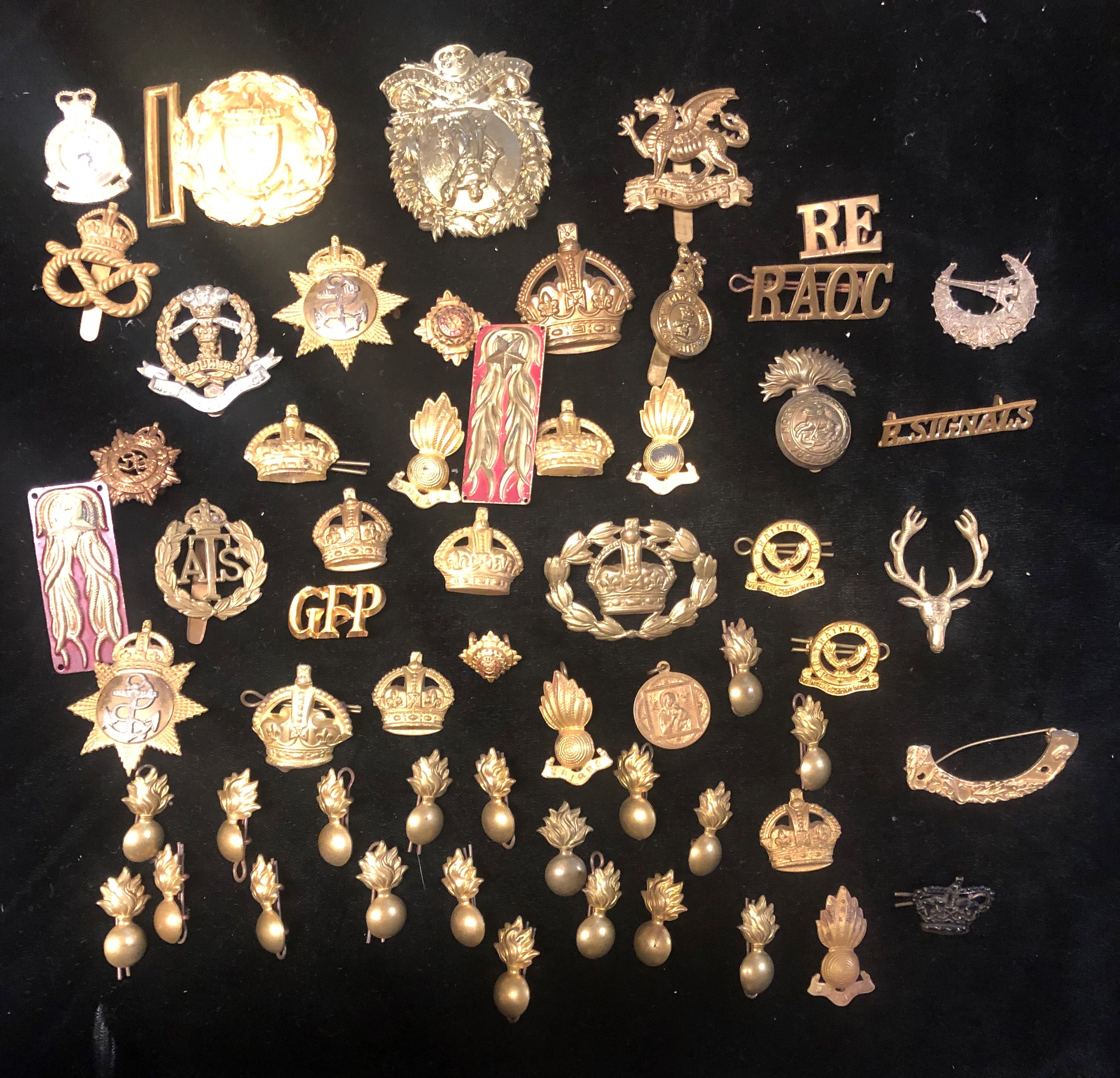 A COLLECTION OF VARIOUS MILITARY BADGES To include naval belt buckle.