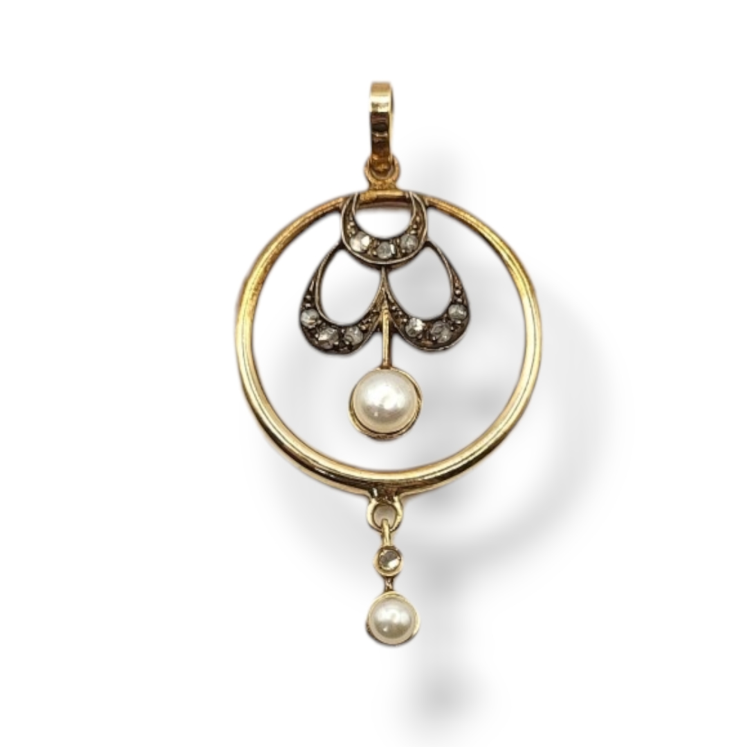 A VINTAGE 14CT GOLD, DIAMOND AND PEARL PENDANT The single pearl set with diamonds in a circular