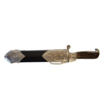 A GERMAN WWII RAD MAN'S DAGGER AND SCABBARD With eagle head horn grip, white metal mounts, by