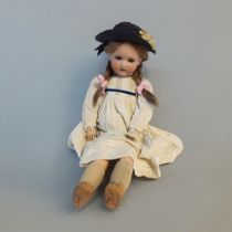 ARMAND MARSEILLE, BISQUE HEAD BABY DOLL, CIRCA 1890 - 1900 Five piece jointed composition body,