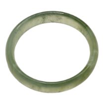 A PALE GREEN CELADON JADE BANGLE (inside diameter 6cm) Condition: good overall
