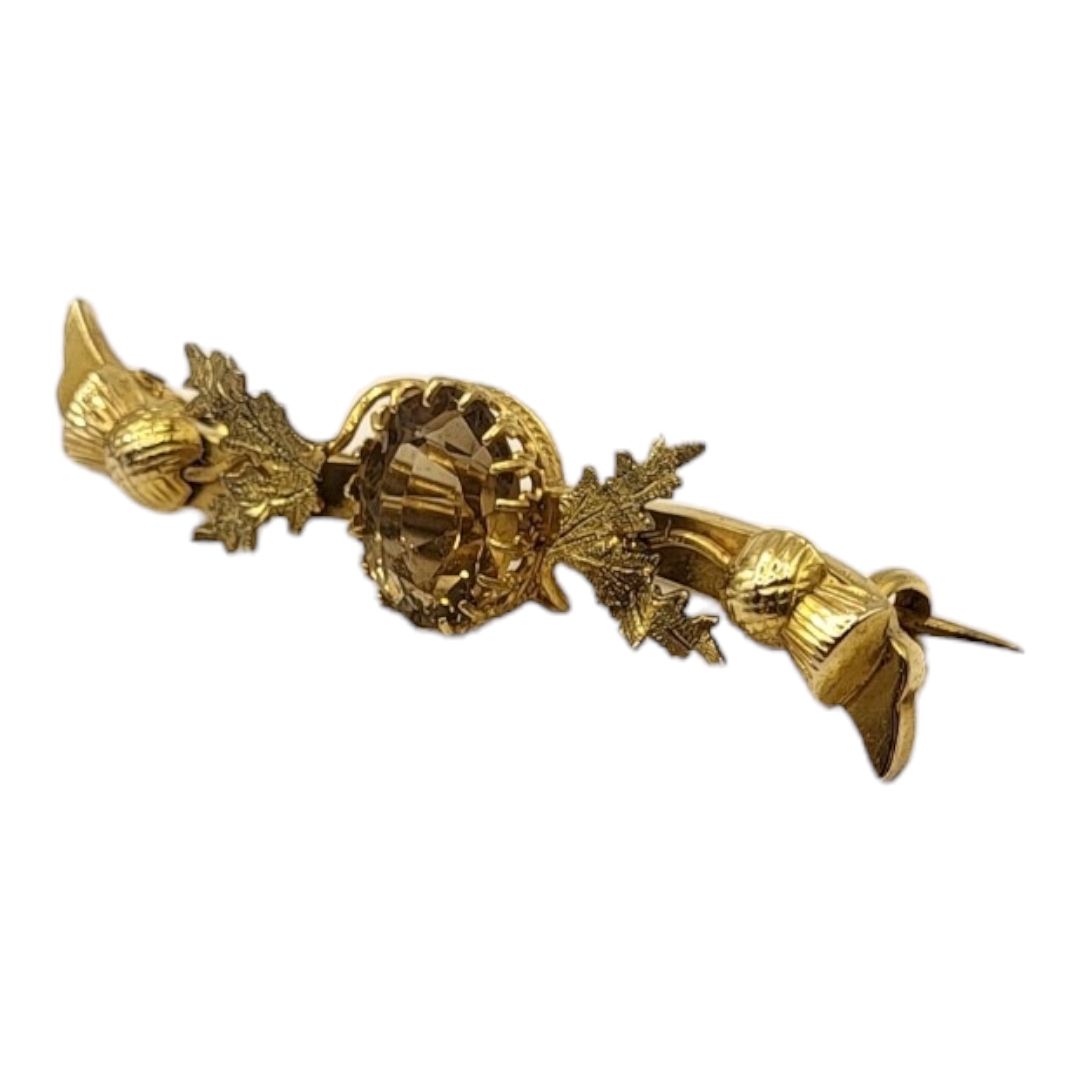 HINDS OF ISLINGTON, A VICTORIAN 9CT GOLD AND CITRINE BROOCH The oval cut stone with Scottish thistle - Image 2 of 4