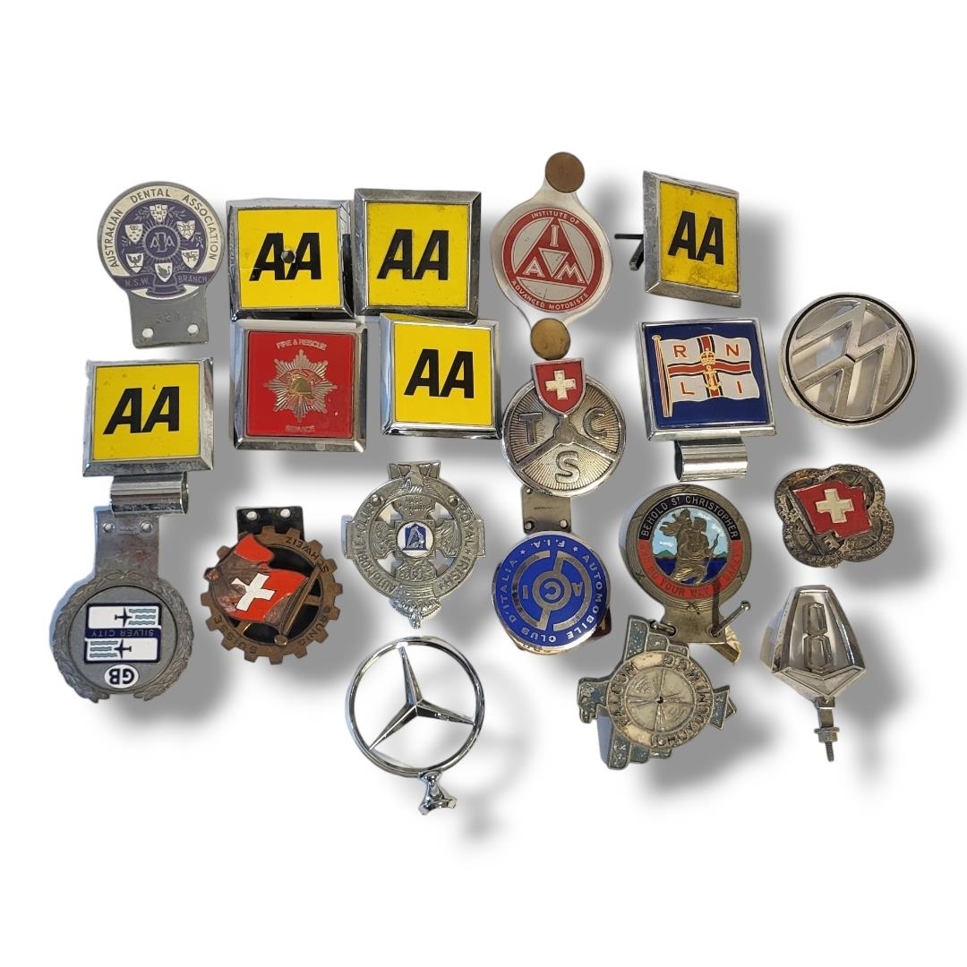 A COLLECTION OF VINTAGE CHROME AND ENAMEL CAR BADGES To include Mercedes, AA Volkswagan, Fire and