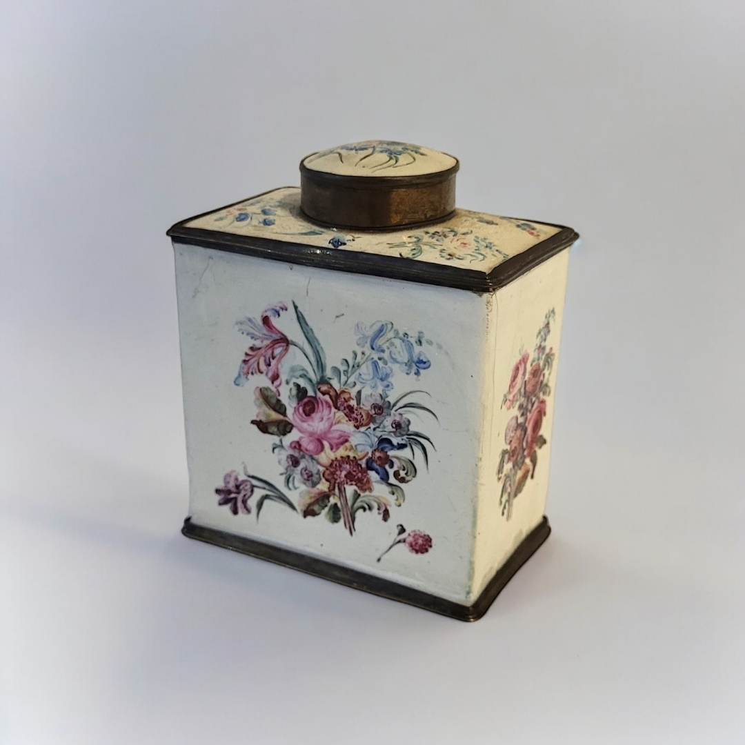 A LATE 18TH/EARLY 19TH CENTURY STAFFORDSHIRE ENAMEL TEA CADDY Rectangular form with hand painted