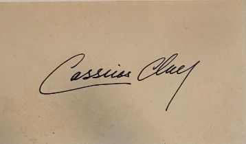 CASSIUS CLAY (MUHAMMAD ALI), AN ORIGINAL PEN ON CARD AUTOGRAPH Hand signed in The Olympic Year of