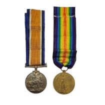 A PAIR OF WWI BRITISH WAR MEDALS To include a silver Defence medal and bronze Victory medal, awarded