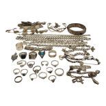 A COLLECTION OF VINTAGE SILVER JEWELLERY To include necklaces, bangles and rings. Condition: good