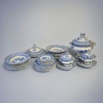 CAULTON, A 19TH CENTURY BLUE AND WHITE POTTERY DINNER SERVICE Comprising a large soup tureen, two