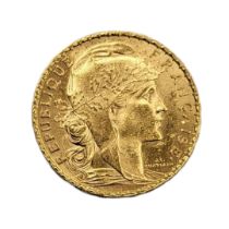 AN EARLY 20TH CENTURY FRENCH 22CT GOLD 20 FRANC COIN, DATED 1909 Bearing a bust of Marianne