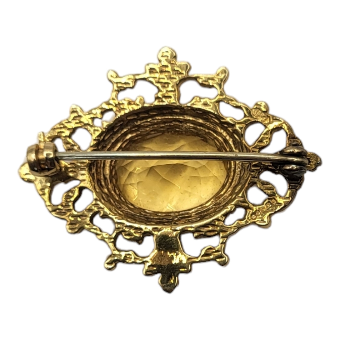 A VINTAGE 9CT GOLD AND CITRINE BROOCH The central oval faceted stone in a pierced design, in a - Image 3 of 3