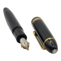 MONTBLANC MEISTERSTÜCK, A VINTAGE BLACK LACQUER FOUNTAIN PEN Having gilt metal mounts no 149 and