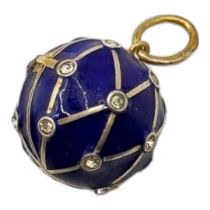 A WHITE METAL AND COBALT BLUE ENAMEL LOCKET Lattice design exterior inlaid with diamanté, having a