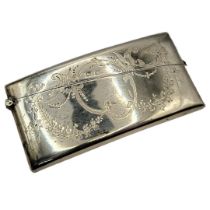 AN EARLY 20TH CENTURY SILVER CALLING CARD CURVED RECTANGULAR CASE With engraved decoration,