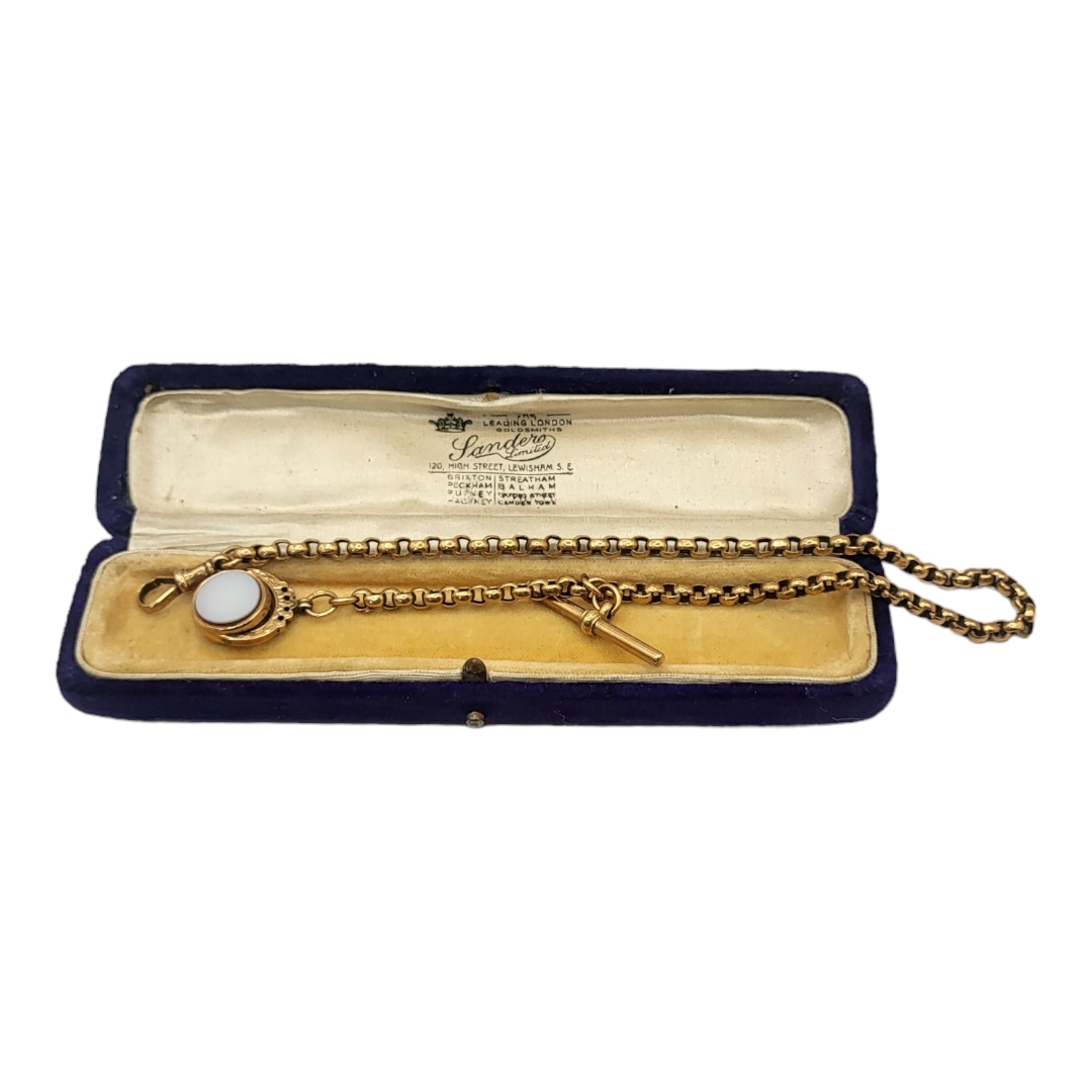 A VICTORIAN 9CT GOLD ALBERT WATCH CHAIN Having box links with T bar and hardstone swivel fob, in a