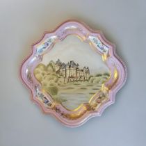 AN 18TH CENTURY FRENCH SEVRÈS STYLE PLATE Having a central image of a Château with a floral and