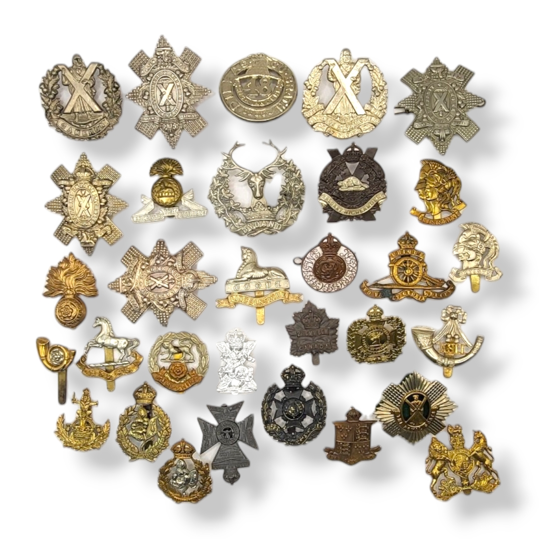 A COLLECTION OF THIRTY EARLY 20TH CENTURY BRITISH ARMY CAP BADGES To include Cameron Highlanders,