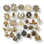 A COLLECTION OF THIRTY EARLY 20TH CENTURY BRITISH ARMY CAP BADGES To include Cameron Highlanders,