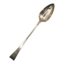 A LARGE GEORGIAN SILVER BASTING SPOON Plain form with engraved initials, hallmarked London, 1814. (