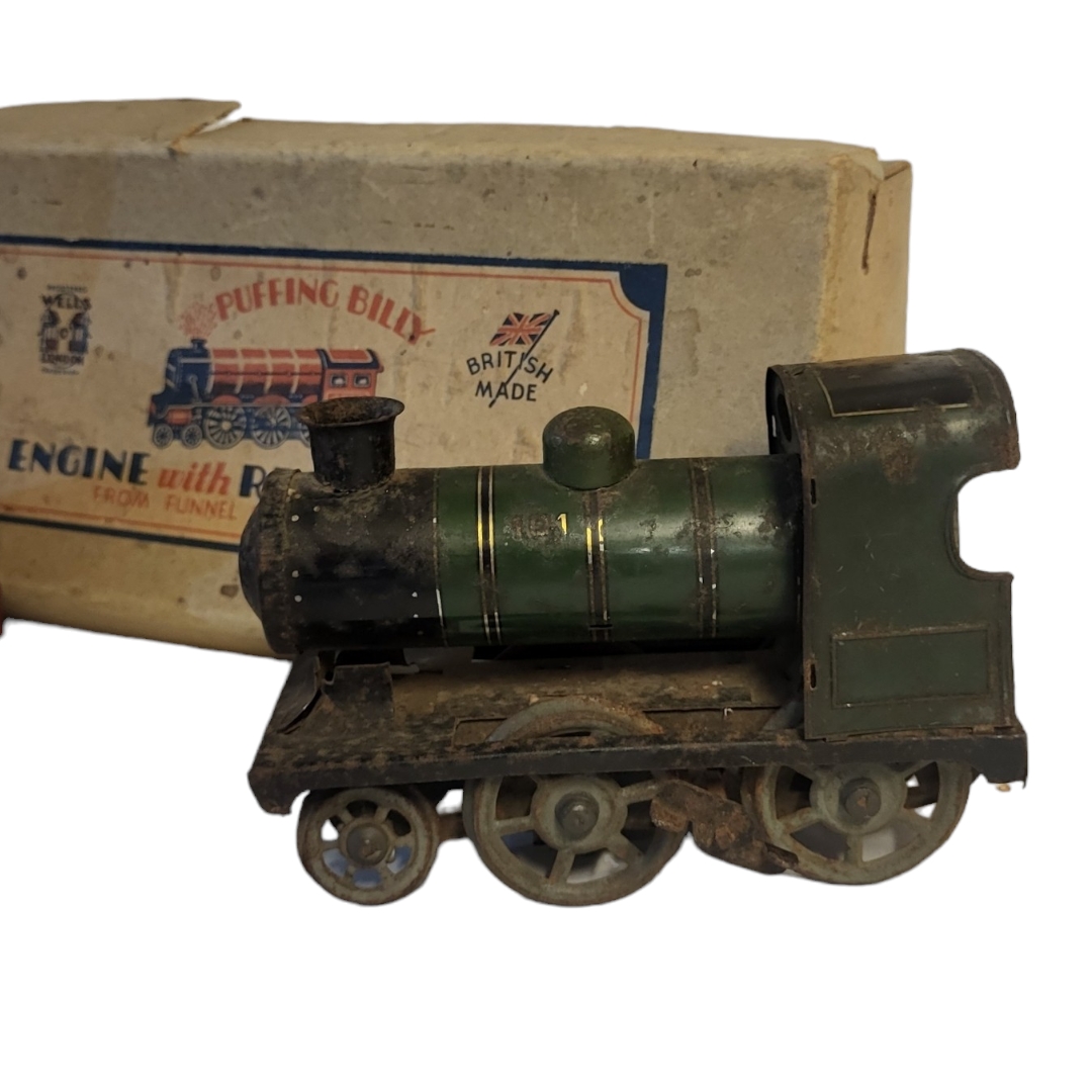 A 1930’S BOXED PUFFING BILLY TINPLATE PAINTED CLOCKWORK MODEL OF LOCOMOTIVE BY WELLS OF LONDON - Image 3 of 4