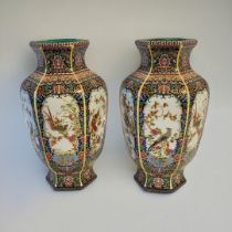 A PAIR OF CHINESE STYLE FAMILLE VERTE HEXAGONAL BALUSTER VASES With floral decoration and stylised