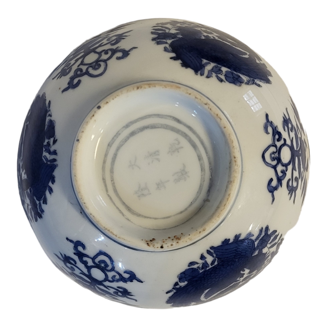 A 19TH CENTURY CHINESE STYLE BLUE AND WHITE FOOTED BOWL With entwined phoenix and lotus - Image 3 of 3