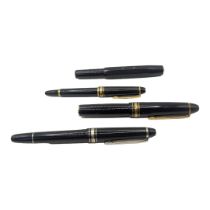 MONTBLANC MEISTERSTÜCK, TWO VINTAGE BLACK LACQUER FOUNTAIN PENS White metal and gilt mounts, both