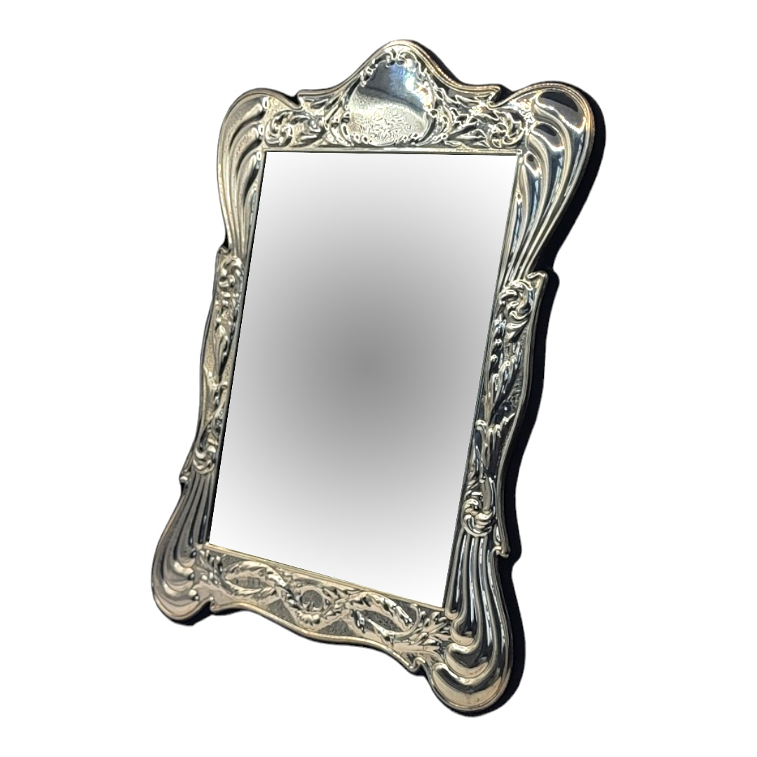 A 20TH CENTURY SILVER EASEL MIRROR Having embossed scrolled frame, hallmarked Birmingham, 1988, in - Image 2 of 3