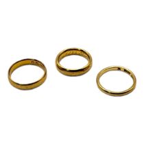 THREE EARLY PLAIN 22CT GOLD WEDDING BANDS. (size J) Condition: good