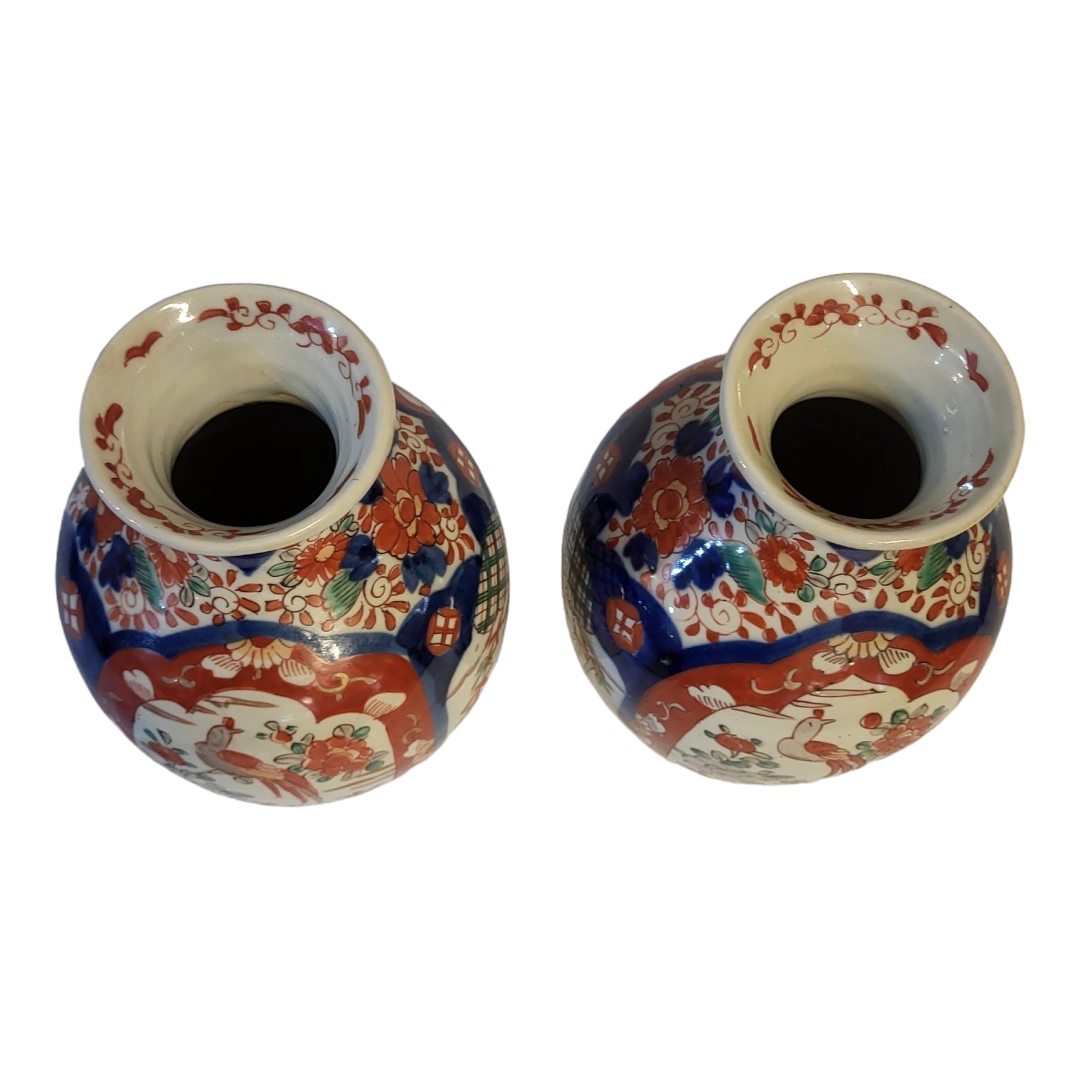 A PAIR OF 18TH CENTURY JAPANESE IMARI STYLE VASES Taking baluster form with painted floral - Image 6 of 9