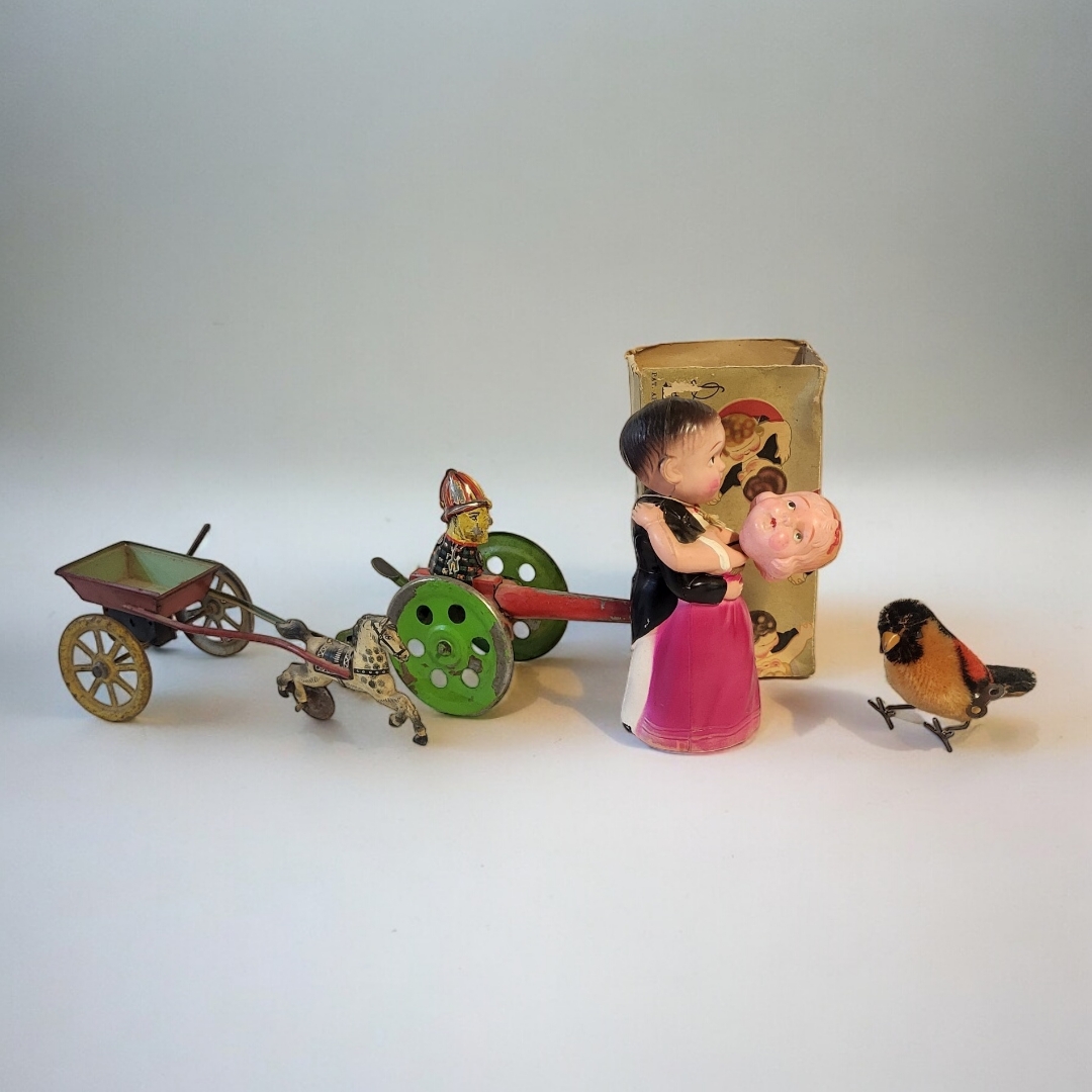 A COLLECTION OF MECHANICAL CLOCKWORK TOYS, CIRCA 1920 Possibly German painted tinplate, clockwork