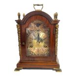 WARMINK, A 20TH CENTURY MAHOGANY AND BRASS MANTEL CLOCK Single brass handle with acorn finials and