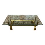 A VINTAGE HEAVY POLISHED BRASS COFFEE TABLE With plate glass top. (100cm x 60cm x 30cm)