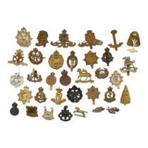 A COLLECTION OF THIRTY EARLY 20TH CENTURY BRITISH ARMY CAP BADGES To include Tank Corps, Royal