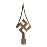 A WWII GERMAN BRASS FLAG POLE FINIAL Having pierced arched finial and swastika. (approx 33cm)