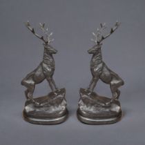 AFTER J. MOIGNIEZ, A PAIR OF LARGE BRONZE STAG STATUETTES Raised on a stone stepped pedestal base,