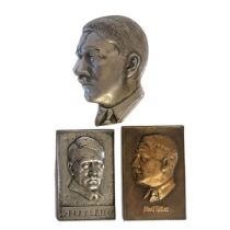 ADOLF HITLER, A WWII GERMAN STEEL PORTRAIT PLAQUE Profile form with screw mount, together with a