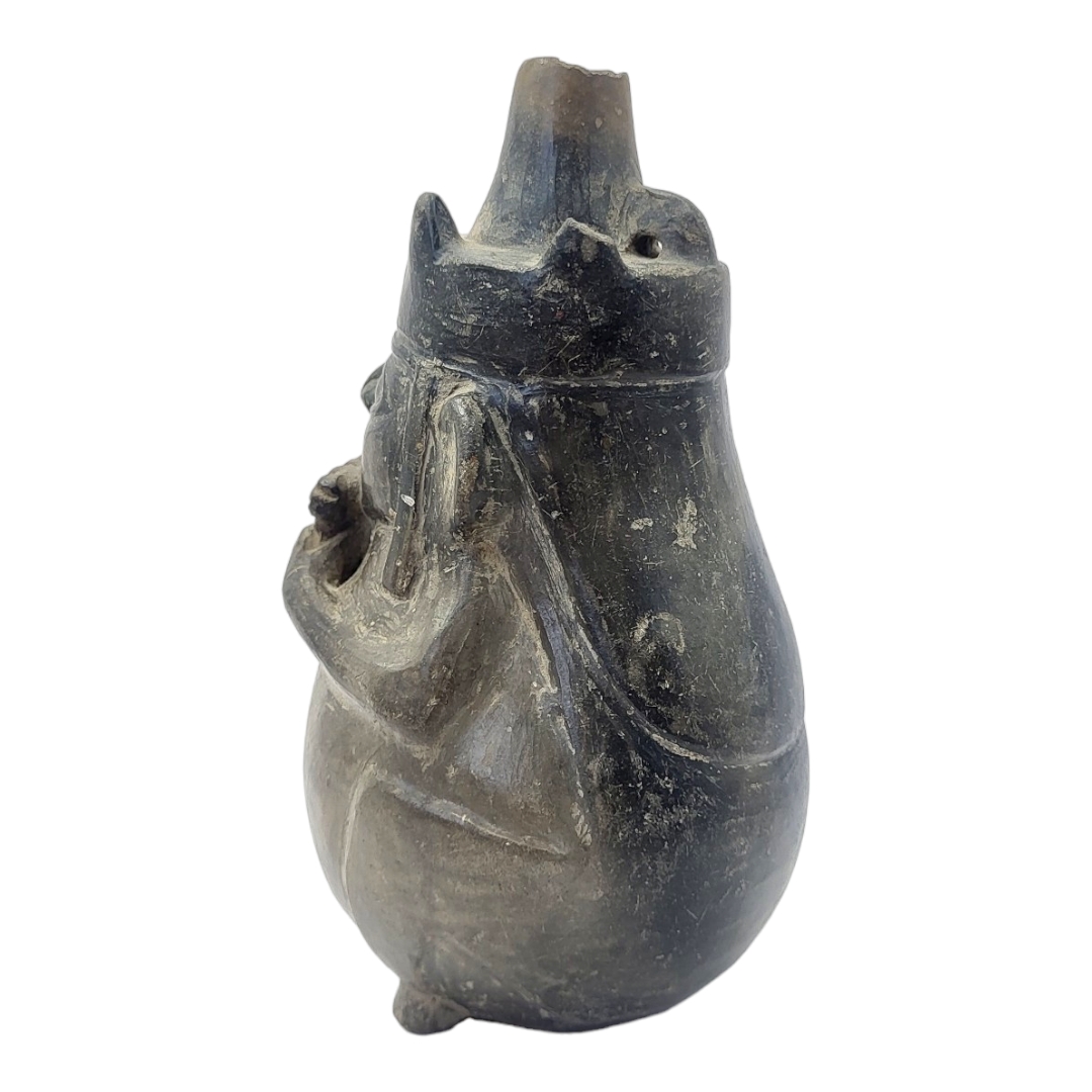 A SOUTH AMERICAN POTTERY FIGURAL JUG Cylindrical finial and playing pan pipes. (approx 18cm) - Image 3 of 5